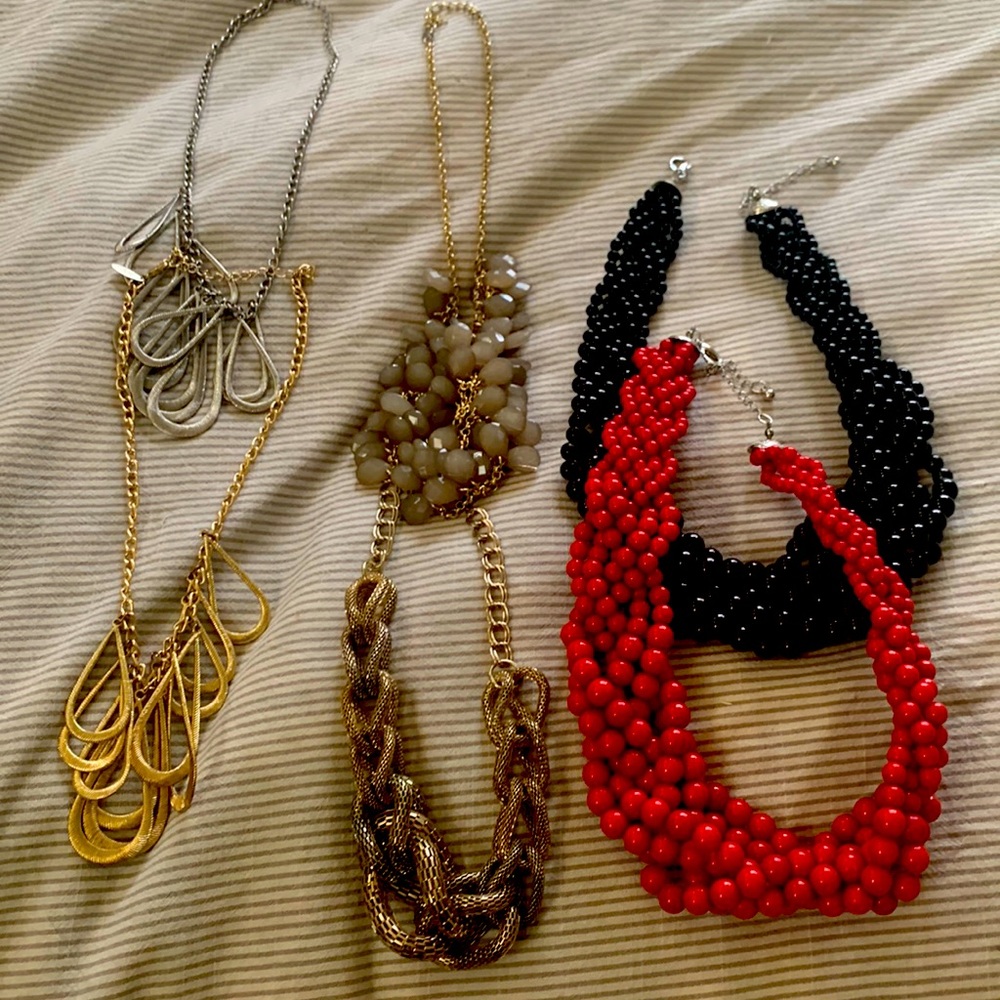 Assorted statement necklaces.